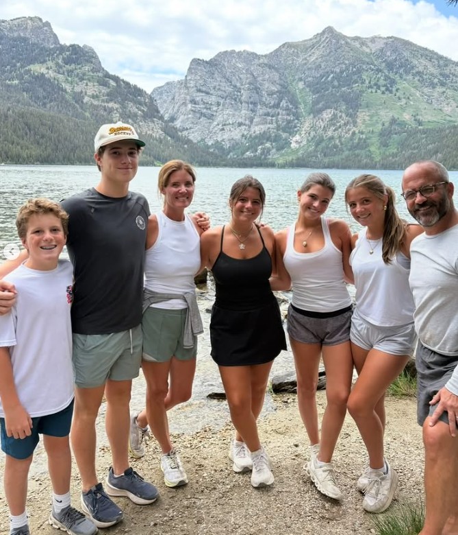 Dan Holland with his family enjoying a day by the lake